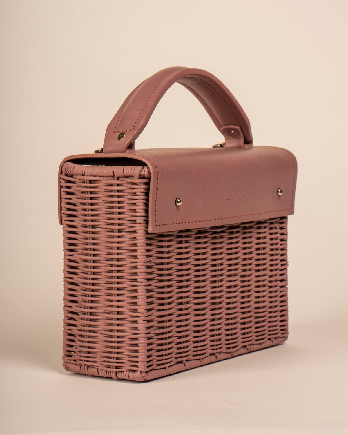 Wicker Wings handwoven Kuai dusk bag, side view.