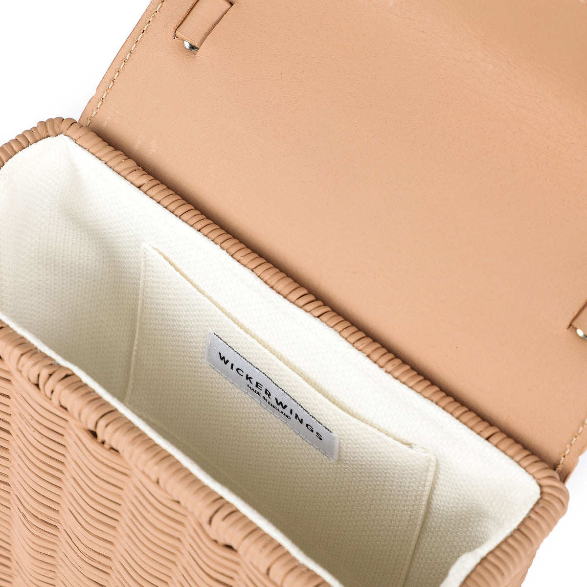Wicker Wings Kuai handwoven wicker bag in Camel, interior logo