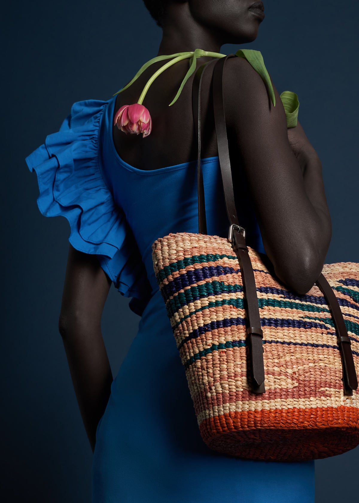 AAKS Hawa handcrafted raffia Tie Dye tote bag , held by model