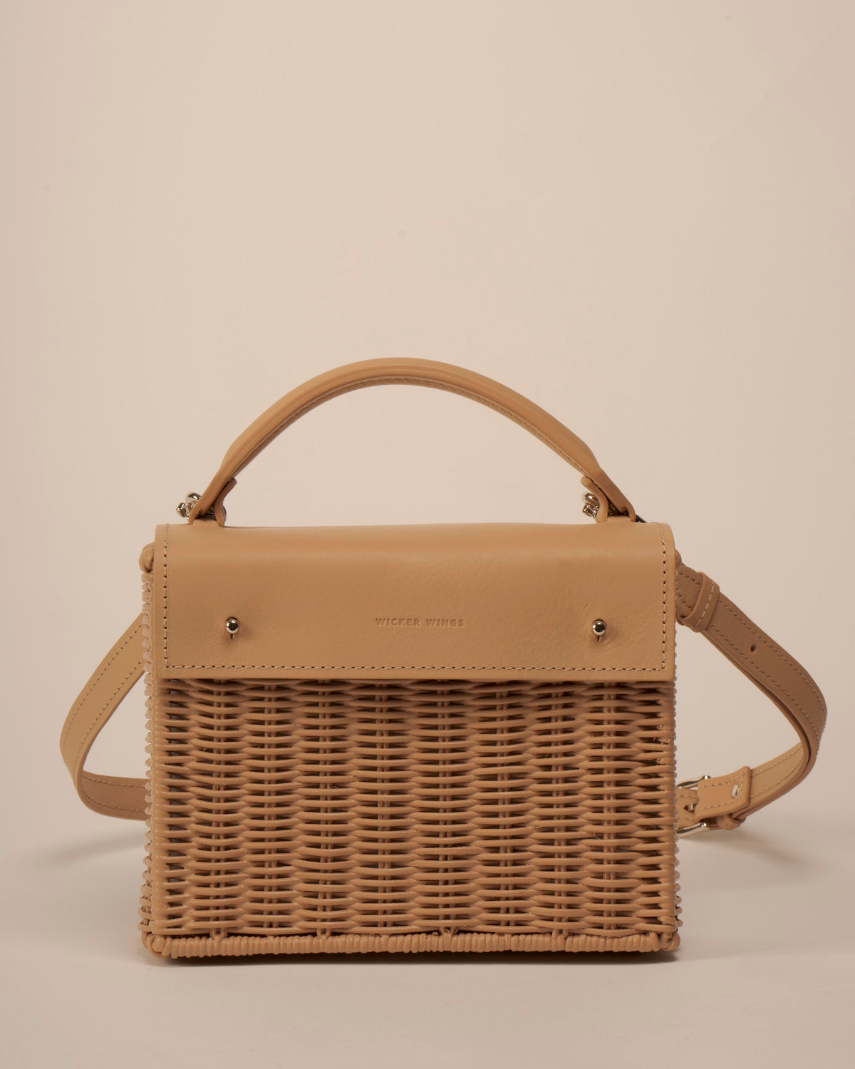 Wicker Wings Kuai handwoven wicker bag in Camel, front-facing