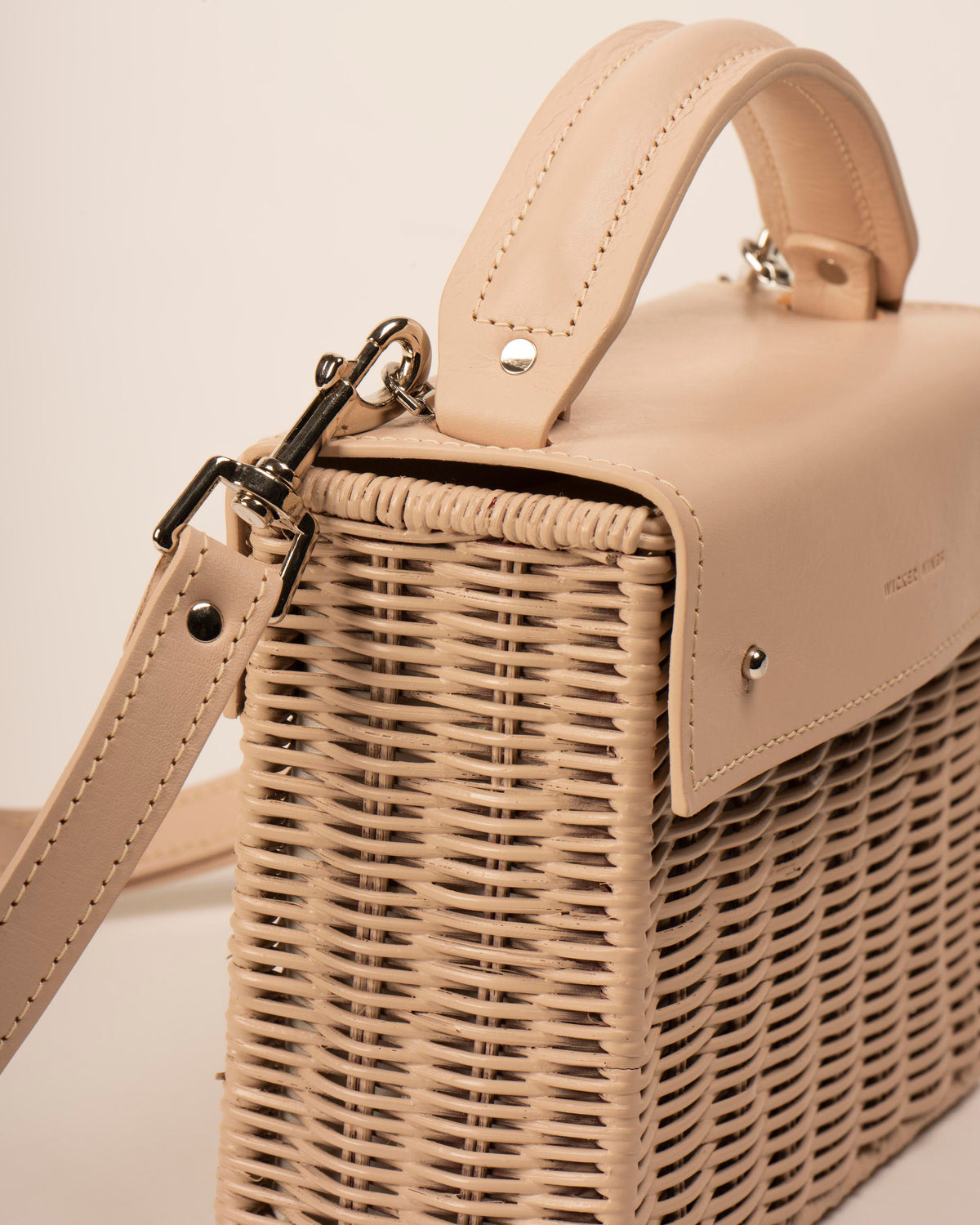 Wicker Wings Kuai handwoven wicker bag in cream, side close up