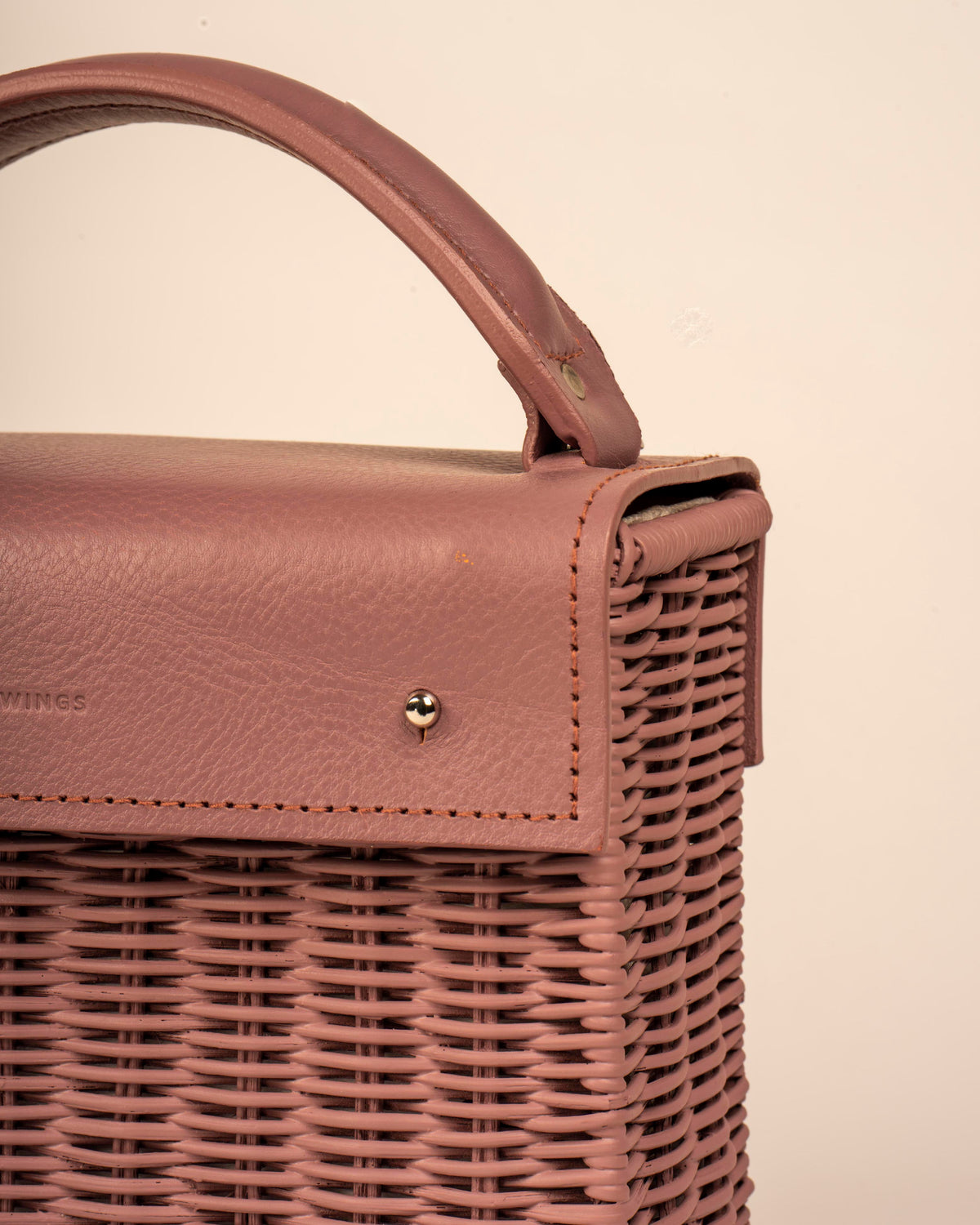 Wicker Wings handwoven Kuai dusk bag, close up of the front flap. 